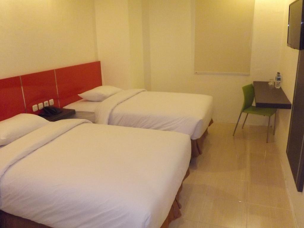 Quin Centro Hotel Палембанг Екстериор снимка