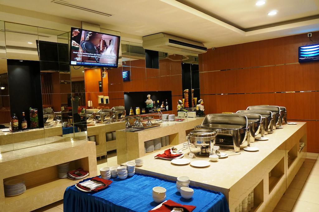 Quin Centro Hotel Палембанг Екстериор снимка