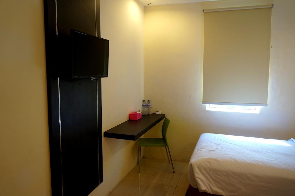 Quin Centro Hotel Палембанг Стая снимка