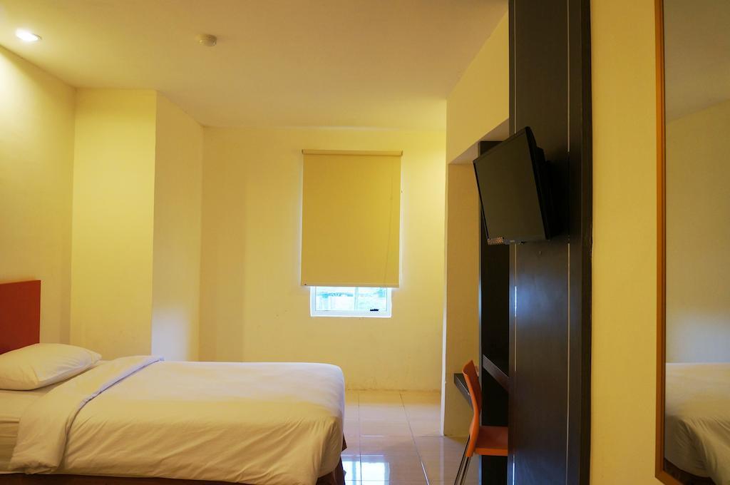 Quin Centro Hotel Палембанг Екстериор снимка