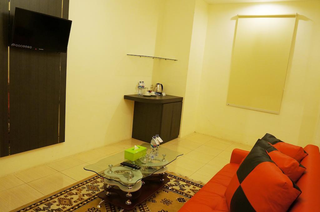 Quin Centro Hotel Палембанг Стая снимка