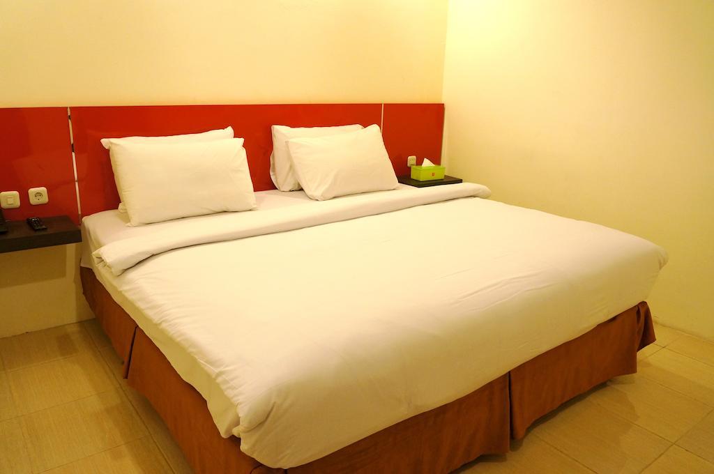 Quin Centro Hotel Палембанг Стая снимка